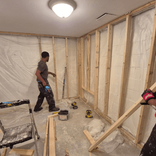Basement framing and renovation in progress by Homes by Covenant construction and design team