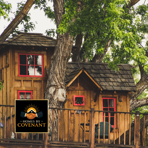 Wooden treehouse-style kids’ outdoor structure built around a tree.