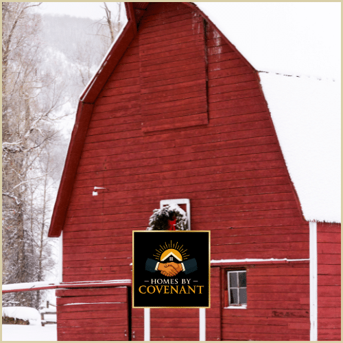 Small red barn-style outdoor structure with white trim.